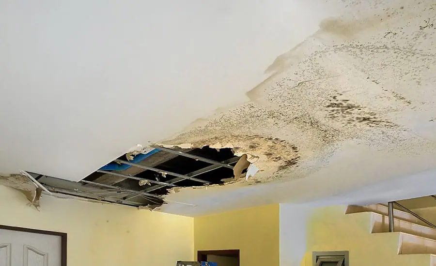 Water-stained ceiling after a leak in a residential interior